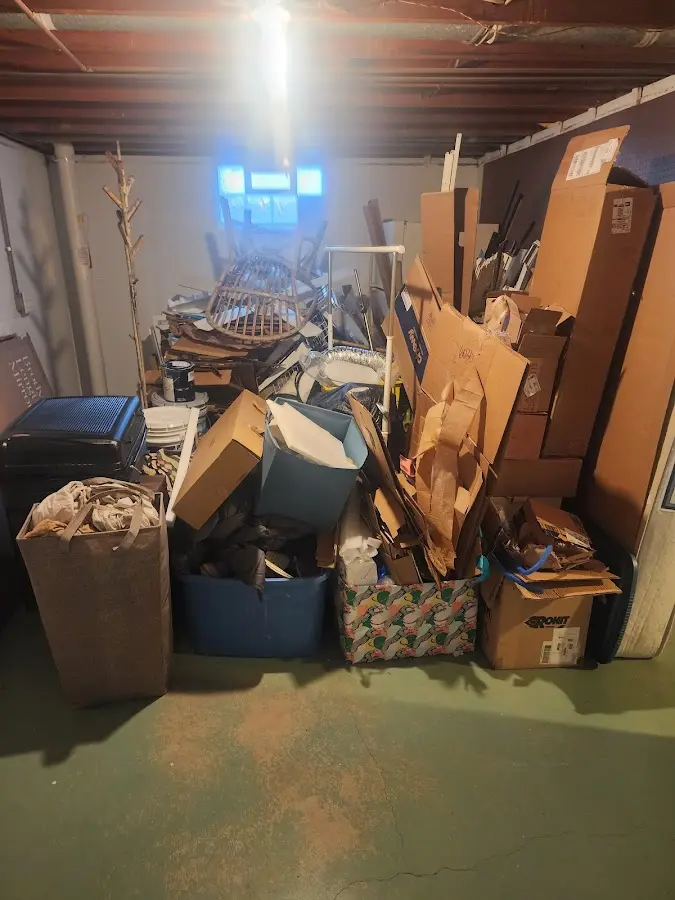 Roll-off dumpster container at job site for Yard Waste Dumpster Rental in Dover-Foxcroft